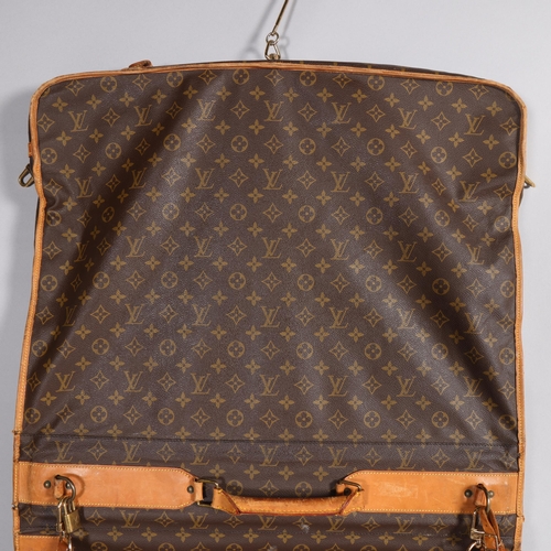 509 - LOUIS VUITTON - a Louis Vuitton Monogram suit carrying case, serial no. VX1920, width 60cm