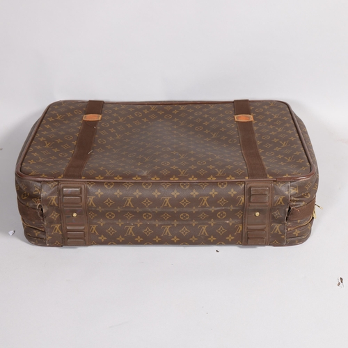 510 - LOUIS VUITTON - a Louis Vuitton Monogram suitcase, approx 65cm x 46cm