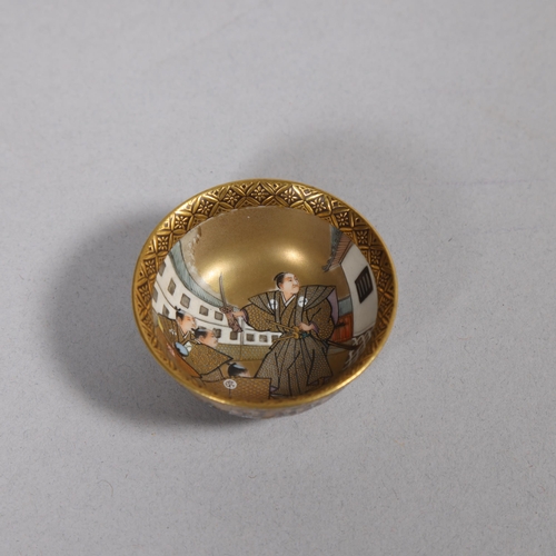 514 - A fine miniature Japanese Satsuma porcelain bowl, hand painted and gilded Samurai Warriors and gilde... 