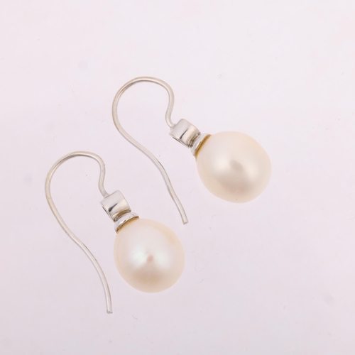 1169 - A pair of 18ct white gold whole pearl and diamond earrings, with shepherd hook fittings, 24mm, 3.9g