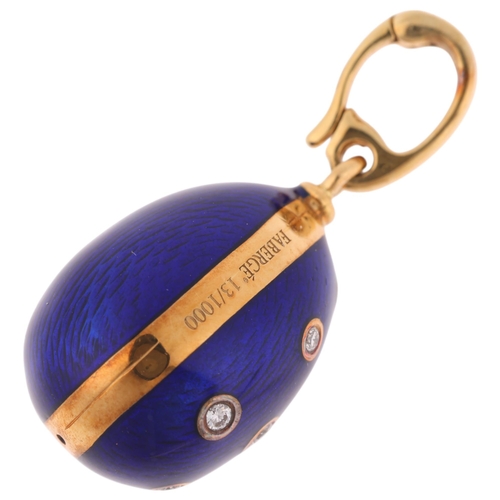 1104 - FABERGE - an 18ct gold blue enamel and diamond egg pendant, with engine turned blue guilloche enamel... 