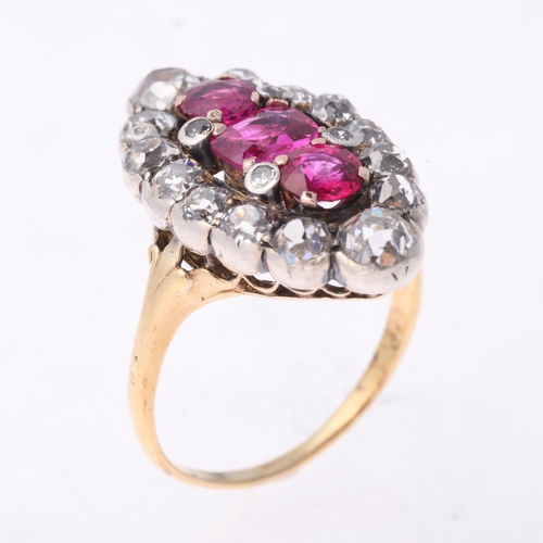 1126 - An Antique Victorian ruby and diamond marquise cluster ring, circa 1890, set with cushion and round-... 