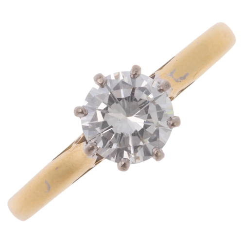 1168 - An 18ct gold 0.75ct single stone diamond ring, maker CJC, London 1989, claw set with modern round br... 