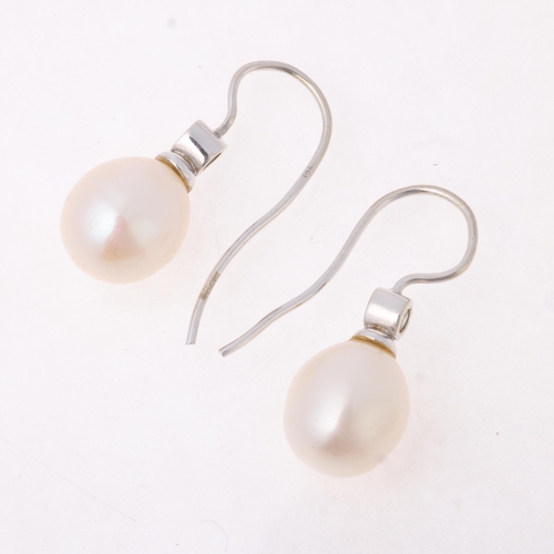 1169 - A pair of 18ct white gold whole pearl and diamond earrings, with shepherd hook fittings, 24mm, 3.9g