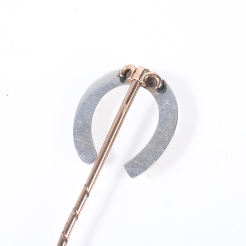 1184 - An Antique Victorian 9ct gold and platinum lucky horseshoe stickpin, circa 1900, unmarked mount test... 