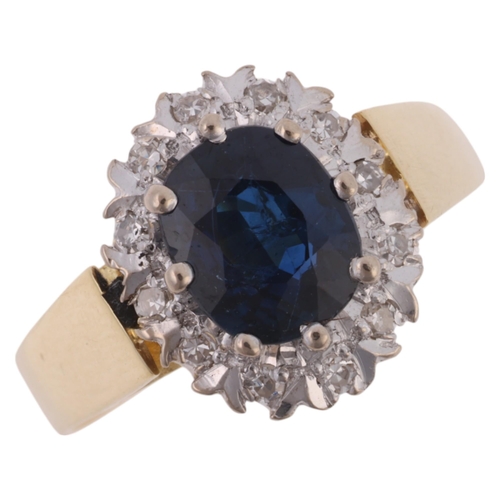 1211 - An 18ct gold sapphire and diamond cluster ring, maker HG Ltd, London 1975, claw set with 1.25ct oval... 