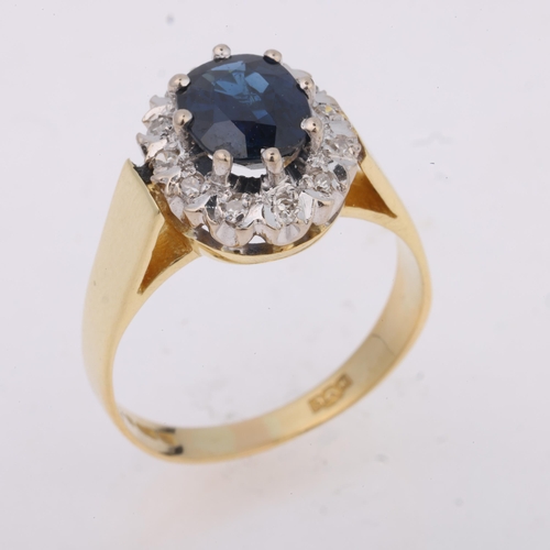 1211 - An 18ct gold sapphire and diamond cluster ring, maker HG Ltd, London 1975, claw set with 1.25ct oval... 