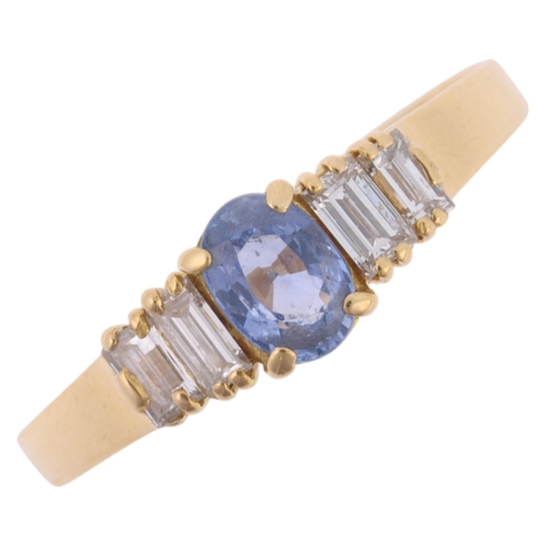 1214 - An 18ct gold five stone sapphire and diamond ring, claw set with 0.55ct oval mixed-cut sapphire flan... 