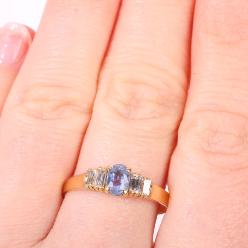 1214 - An 18ct gold five stone sapphire and diamond ring, claw set with 0.55ct oval mixed-cut sapphire flan... 