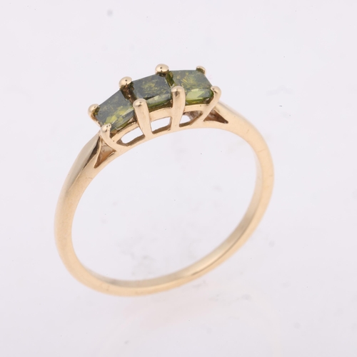 1215 - A 9ct gold three stone green diamond ring, Birmingham 2019, claw set with Princess-cut diamonds, tot... 