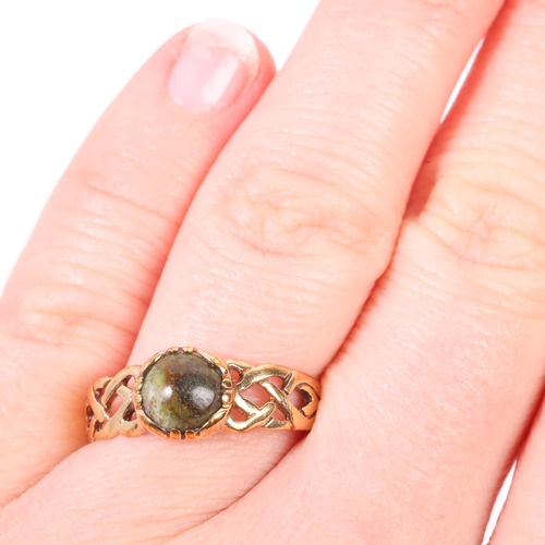 1269 - An Irish 9ct gold Connemara marble ring, maker FNM, with Celtic knot pierced shoulders, setting heig... 