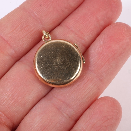 1278 - A Vintage 9ct gold photo locket pendant necklace, Chester 1957, circular form with foliate engraved ... 