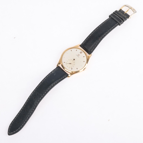 1004 - OMEGA - a Vintage 18ct gold mechanical wristwatch, circa 1950, white dial with gilt lozenge hour mar... 