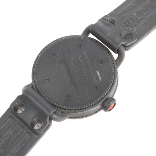 1027 - NIXON - a black stainless steel 'The October' quartz calendar wristwatch, ref. A488760, black dial w... 