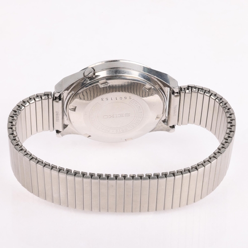 1032 - SEIKO - a stainless steel Diashock automatic calendar bracelet watch, ref. 6619-7040, circa 1967, si... 