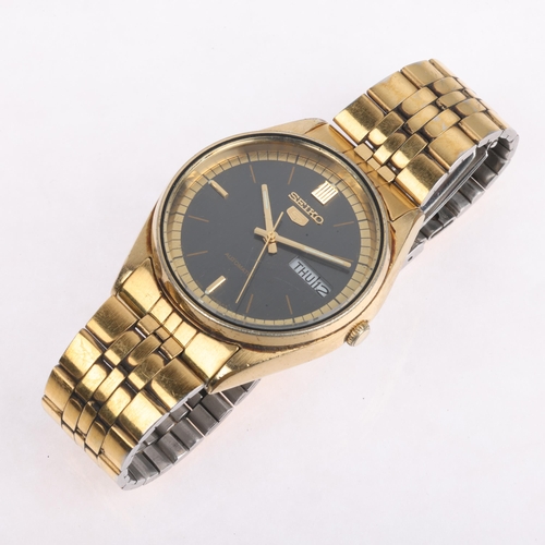 1033 - SEIKO 5 - a gold plated stainless steel automatic calendar bracelet watch, ref. 6309-8900, circa 198... 