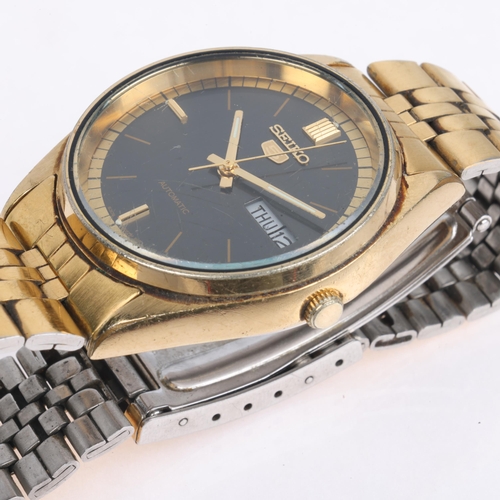 1033 - SEIKO 5 - a gold plated stainless steel automatic calendar bracelet watch, ref. 6309-8900, circa 198... 