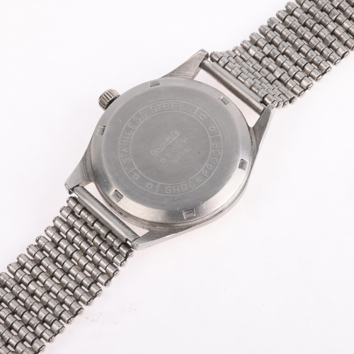 1045 - HMT - a stainless steel Pilot Para Shock mechanical bracelet watch, silvered dial with red inner Ara... 