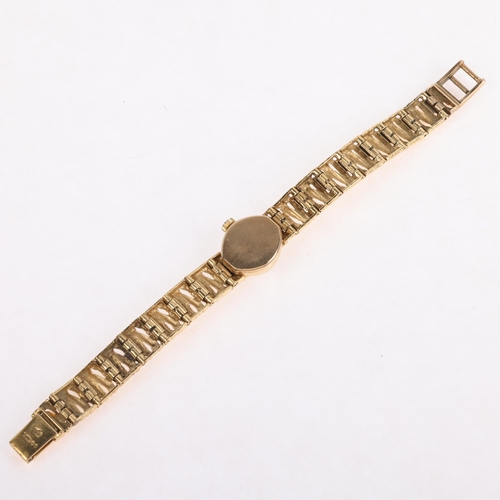 1058 - ROTARY - a lady's Vintage 9ct gold mechanical bracelet watch, circa 1970s, silvered dial with gilt b... 