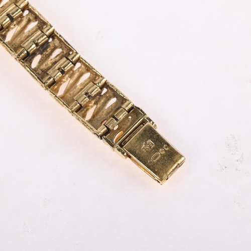 1058 - ROTARY - a lady's Vintage 9ct gold mechanical bracelet watch, circa 1970s, silvered dial with gilt b... 