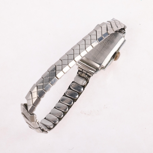 1063 - HERMES - a lady's Vintage chrome plated mechanical bracelet watch, circa 1960s, silvered dial with g... 