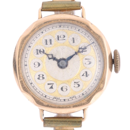 1064 - A lady's 9ct gold mechanical wristwatch, circa 1920s, silvered and gilt dial with black Arabic numer... 