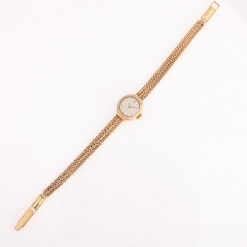 1066 - CYMA - a lady's Vintage 9ct gold mechanical bracelet watch, circa 1960s, silvered dial with gilt hal... 