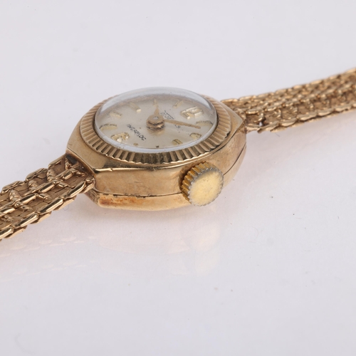 1066 - CYMA - a lady's Vintage 9ct gold mechanical bracelet watch, circa 1960s, silvered dial with gilt hal... 