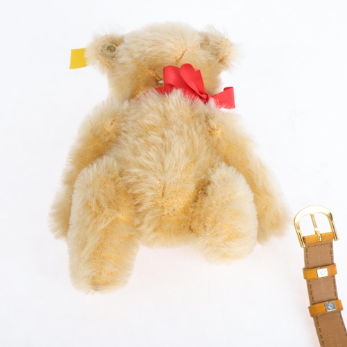 1083 - STEIFF - a group of Steiff collectables, including Teddy's watch, original teddy bear, and pair of e... 