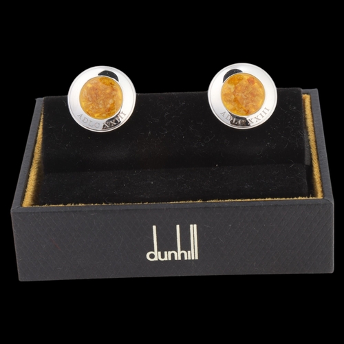 1455 - DUNHILL - a pair of sterling silver and amber cufflinks, made in connection to the Dunhill 2370 Whis... 