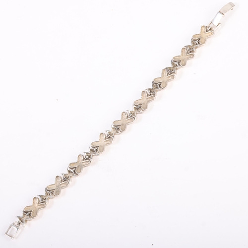 1466 - A sterling silver X-link chain bracelet, band width 10.3mm, 18cm, 24.8g