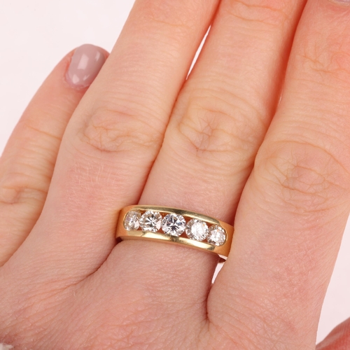 1117 - An 18ct gold five stone diamond ring, channel set with modern round brilliant-cut diamonds, total di... 