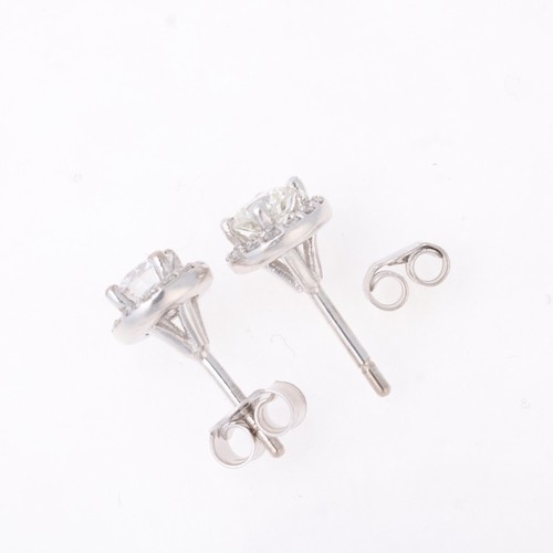 1145 - A pair of 18ct white gold diamond halo cluster stud earrings, set with modern round brilliant-cut di... 