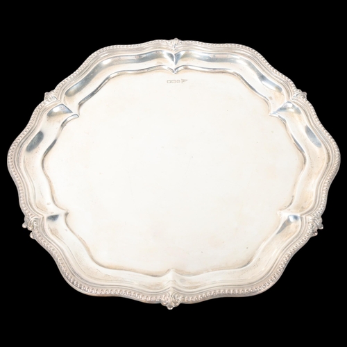 1802 - A George V silver salver, Walker & Hall, Sheffield 1910, hexagonal form, with piecrust edge and bead... 