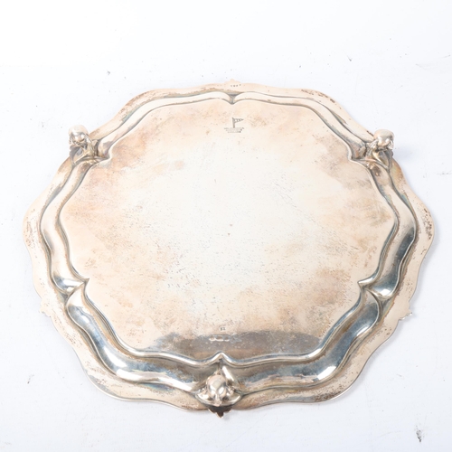 1802 - A George V silver salver, Walker & Hall, Sheffield 1910, hexagonal form, with piecrust edge and bead... 