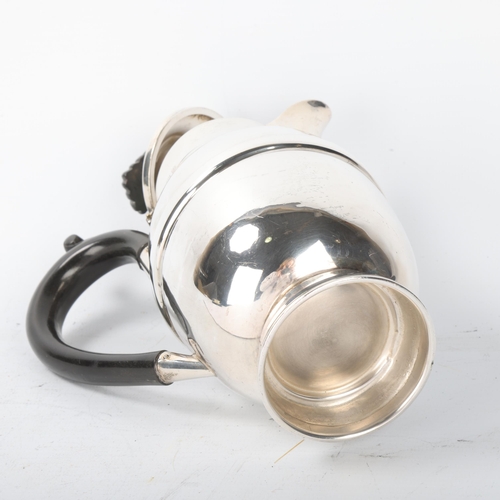 1805 - A George V silver hot water jug, A L Davenport Ltd, Birmingham 1932, waisted ovoid form, with ebonis... 