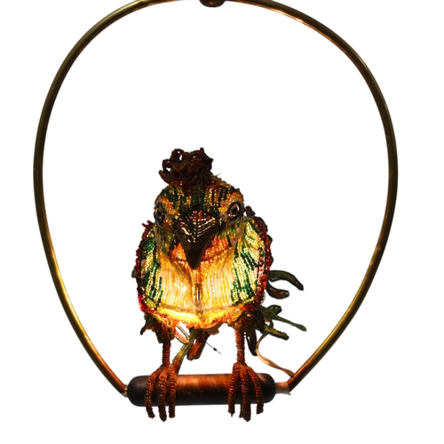 515 - A Venetian Murano glass beadwork Parrot lamp on a brass perch. Length 39cm from hanging loop to perc... 