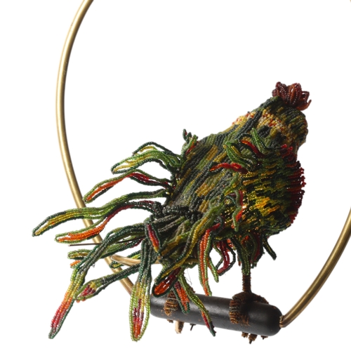 515 - A Venetian Murano glass beadwork Parrot lamp on a brass perch. Length 39cm from hanging loop to perc... 