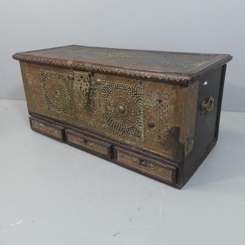 2218 - A 19th century Zanzibar trader's chest of hardwood construction, with copper and studded brass decor... 