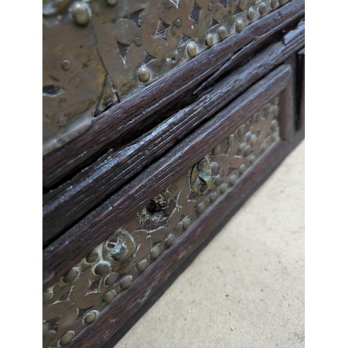 2218 - A 19th century Zanzibar trader's chest of hardwood construction, with copper and studded brass decor... 