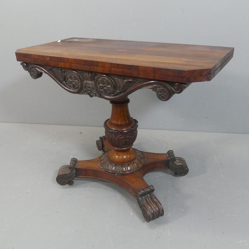 2220 - MEYER & BEKENN - A Regency rosewood fold-over tea table, with carved decoration and raised on turned... 