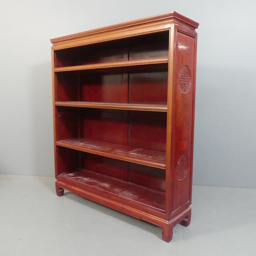 2111 - A Chinese hardwood open bookcase with three adjustable shelves. Width 107cm, height 122cm, depth 28c... 