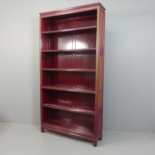 2113 - A Chinese hardwood open bookcase with five adjustable shelves. Width 106cm, height 208cm, depth 27cm... 