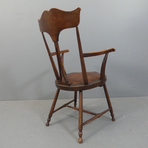 2140 - An Arts & Crafts oak and studded leather upholstered moustache back side chair, impressed H.S behind... 