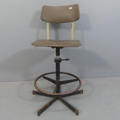 2144 - A mid-century industrial machinist's stool, with height adjustable moulded plastic swivel seat.