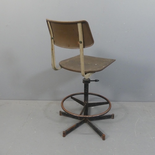 2144 - A mid-century industrial machinist's stool, with height adjustable moulded plastic swivel seat.