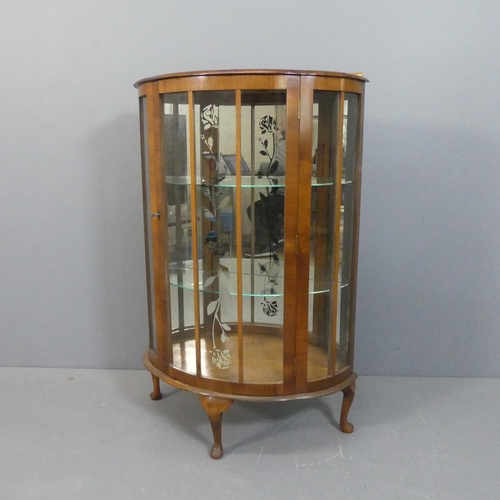 2149 - A 190s walnut demi-lune display cabinet, with two fixed glass shelves and raised on cabriole legs. W... 