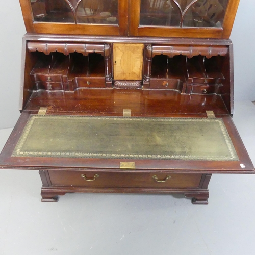 2155 - A reproduction mahogany three-section bureau bookcase. Width 123cm, height 233cm, depth 61cm.