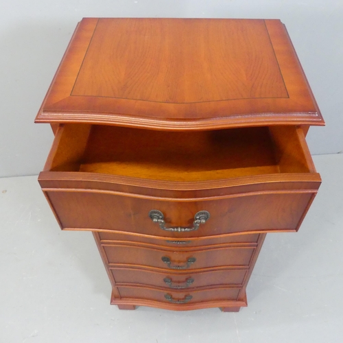 2158 - A reproduction yew-wood serpentine fronted chest of six drawers. Width 51cm, height 101cm, depth 39c... 