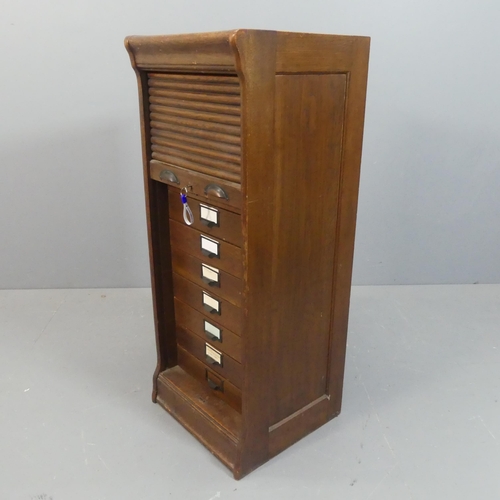 2176 - A Victorian oak tambour front filing chest of ten drawers. Width 44cm, height 109cm, depth 42cm.